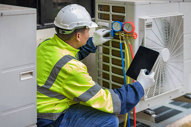 Professional Heat Pump Repair technician working in El Monte, CA